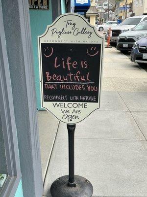 Sign marking entrance to gallery