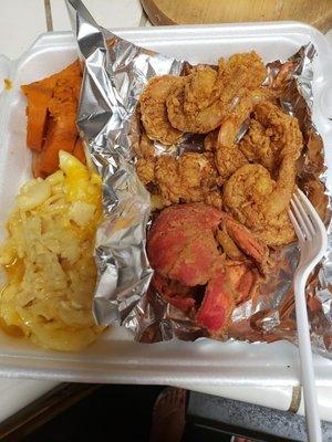 Fried Lobster with mac and cheese, yams and side of shrimp.