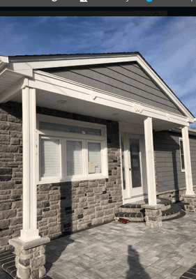 Stone and AZEK work around entry-way