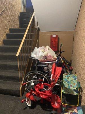 Junk being stored in the hallways for over 8 months. The apartment complex doesn't do anything about it.