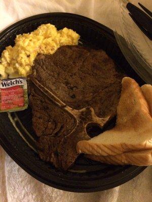 T-Bone Steak, eggs with cheese and Toast