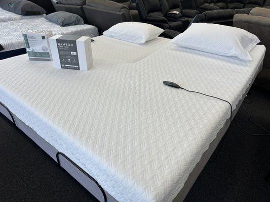 Split Top King Memory Foam Mattress On Adjustable Base.  Included with Purchase  is a Mattress Protector And Sheet Set