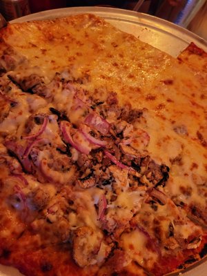 Half cheese pizza, half sausage onion and mushroom.