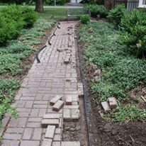 Brick walkway in need of repair - May 2016