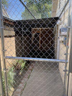 Side yard dog run.  Completely enclosed