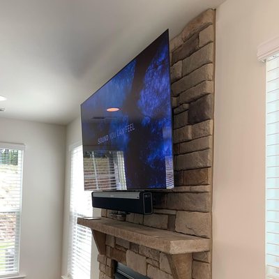 -Fire Place Mount 
-Cable cord & Electrical outlet relocation 
-Soundbar mounted