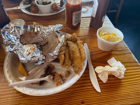 Brisket/catfish/cheese grits/fries - all disappointing... the brisket was anything but tender and catfish was blah.