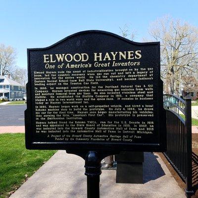 plaque that accompanies the bronze statue of Elwood Haynes