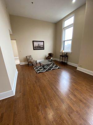 High ceilings, large windows with natural light.