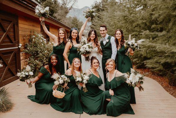 Bridal party with flower boutiques