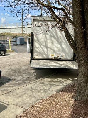 Parked off the street in an alley- didn't obstruct traffic