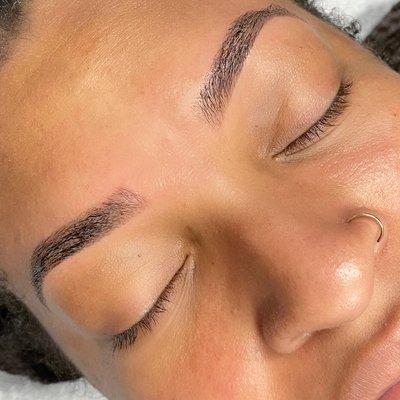 Brow wax and tint to enhance definition.