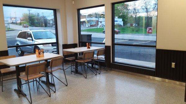 Dining area, to the right as you enter. Note the one lonely outlet in the corner.