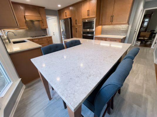 Remodeled kitchen with L-shaped island