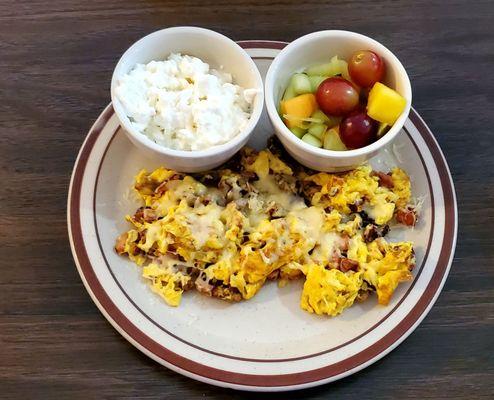 Meat lovers omelette (as a scramble) w/ jack cheese. O/S: cottage cheese, and mixed fruit. Hidden Mickey!