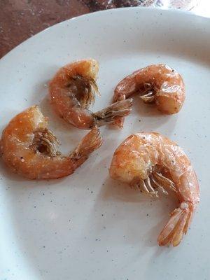 Unpeeled fried Chineese shrimp with all the legs.