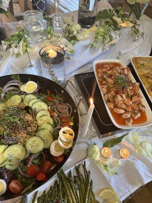 House salad, sweet and chilly salmon bites, baked chicken in creamy Cajun sauce, lemon and herb asparagus