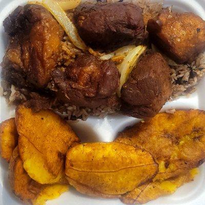 Fried pork, plantains, beans and rice.