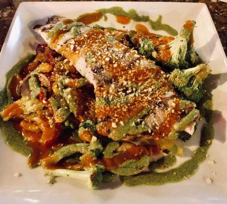 Pistachio crusted rockfish over veggies