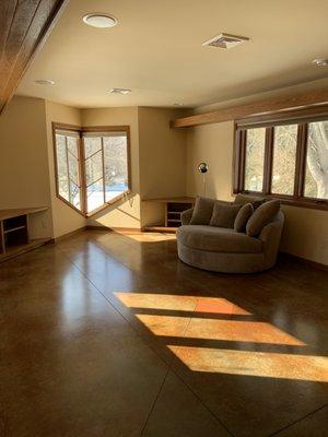 Concrete floor (tinted red-brown)