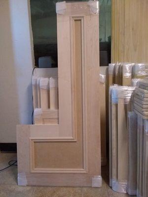 Special L shape door with applied molding.