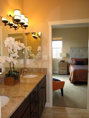 Master bath looking into bedroom of staged home.