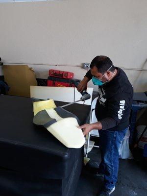 Adrian shaping a Triumph sport bike seat