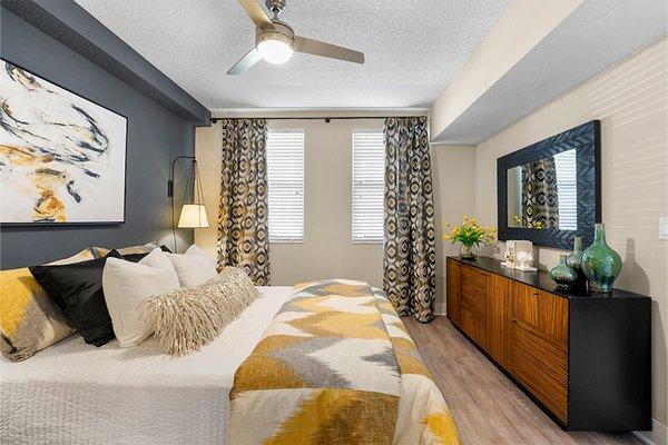 Bedrooms feature ceiling fans and plenty of sunlight