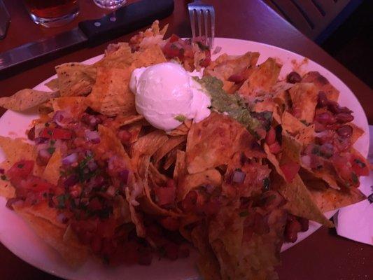 Nachos = mostly a plate of naked chips.