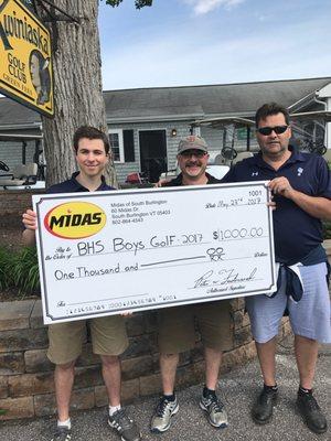 Burlington High School Boys Golf team raised $1000.00! through free oil change certificate donated by Midas!