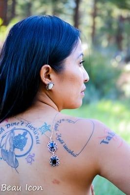 Amazing jewelry, black onyx necklace, and white turquoise earrings. Absolutely gorgeous!!!