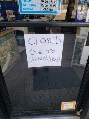 Racist sign in the store window. Owners should be ashamed.