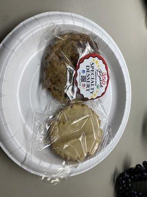 This a picture of a vegan chocolate chip cookie and a butter cookie!