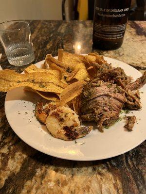 Pork shoulder, plantain chips, and shrimp