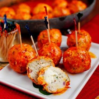 Buffalo Stuffed Meatballs | Delicious ground turkey meatballs oozing with bleu cheese and lathered in our tangy buffalo sauce