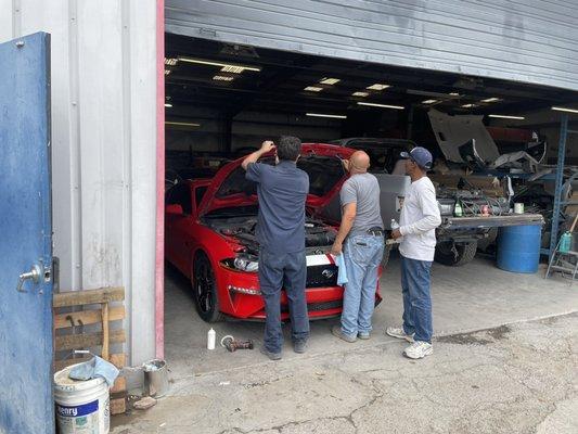 Guys working on the 2018 Mustang GT.