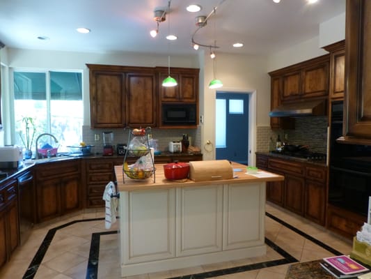 Jonathan recreated a white island I saw in Houzz with maple butcherblock top and soft close drawers.