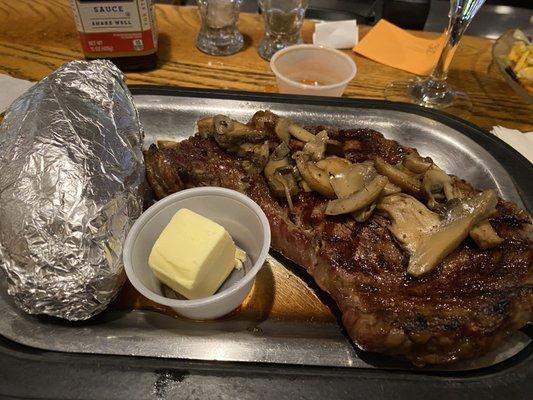 Ribeye Steak with mushrooms and baked potato with side salad for $19.95