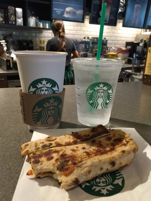 Feta egg sandwich, Americano, and ice water.