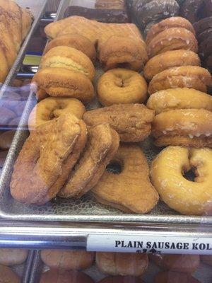 So cute! These donuts have handles for dunking into the coffee!