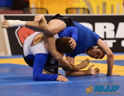 Nava BJJ student competing at No-Gi Worlds, finishing a Triangle submission choke.