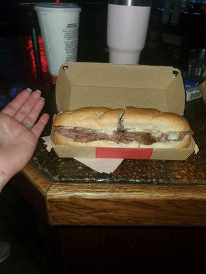 A dry sandwich with no French dip... thats what is in this photo