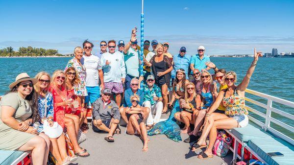 Customers Enjoying a scenic day aboard The Salty Mermaid