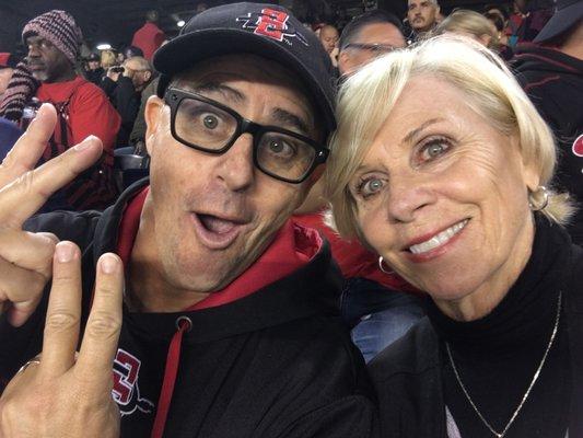 Mother and son at the ballgame.