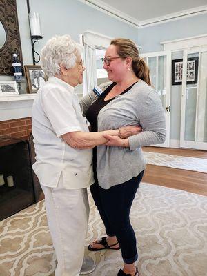 Care Manager and Client hugging and enjoying life