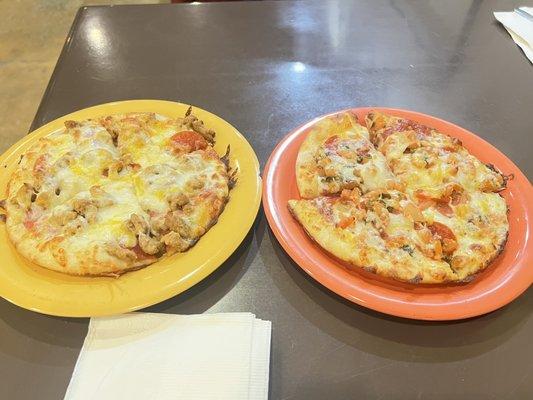 He got some sort of meat pizza. Yellow plate. Orange plate is the bruschetta pizza.