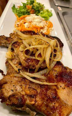 Pork Chops Grilled Topped with Grilled onions with a side salad and Tomato Pasta