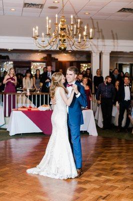 A bride and groom share their first dance inside the Greencroft Club in Charlottesville. (April B Photography)