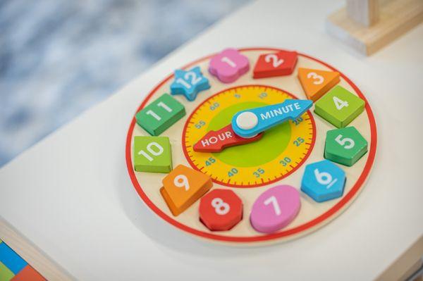 Clock in play area to learn time in Best Naperville Preschool KLA Schools of Naperville West