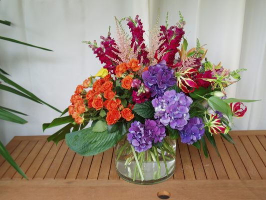 Vibrant hydrangea,roses,gloriosa lilies and snapdragons